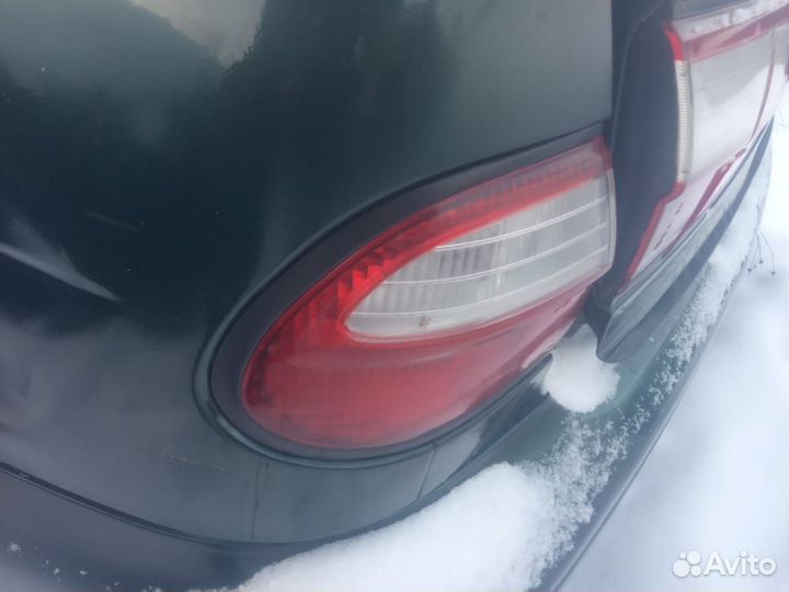 Фонарь задний Nissan Almera N15