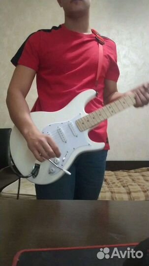 Учитель игры на гитаре