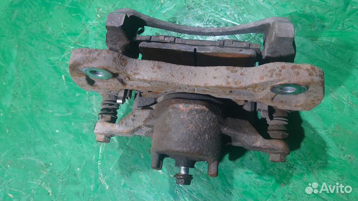 Суппорт передний L L200/4 mitsubishi L200 (2006-20