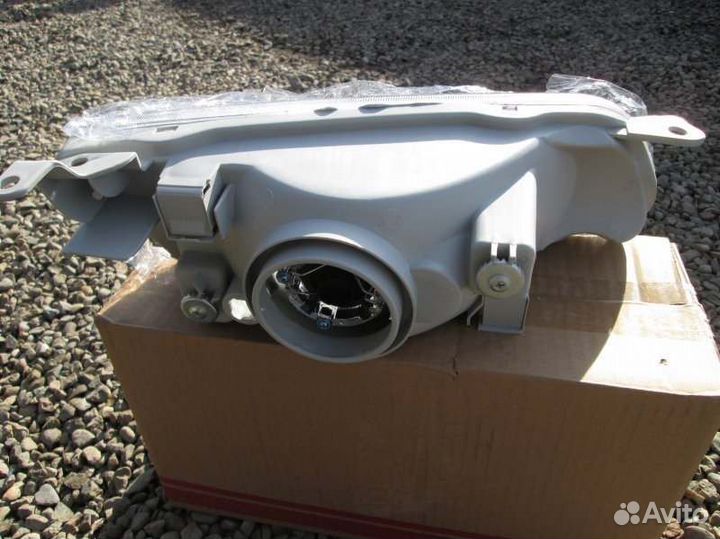 Фара левая Toyota Sprinter AE110