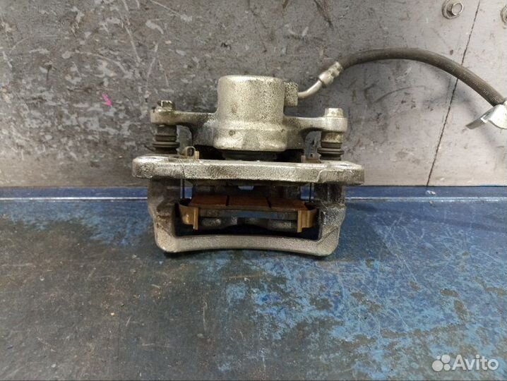 Суппорт задний левый Chevrolet Captiva C140