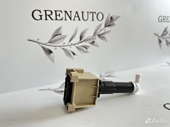 Mazda CX 7 форсунка омывателя фары левая 10-12