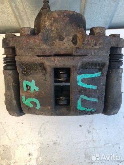 Суппорт тормозной передний правый Renault Logan