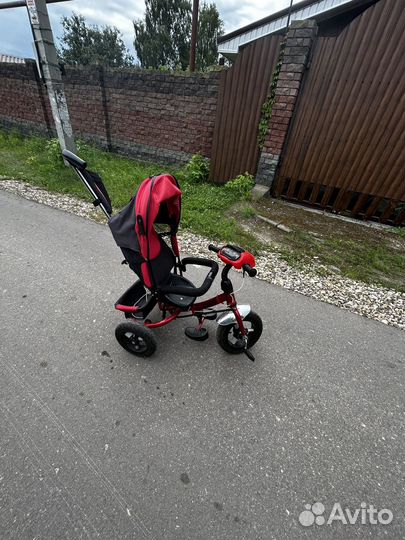 Детский трехколесный велосипед с ручкой