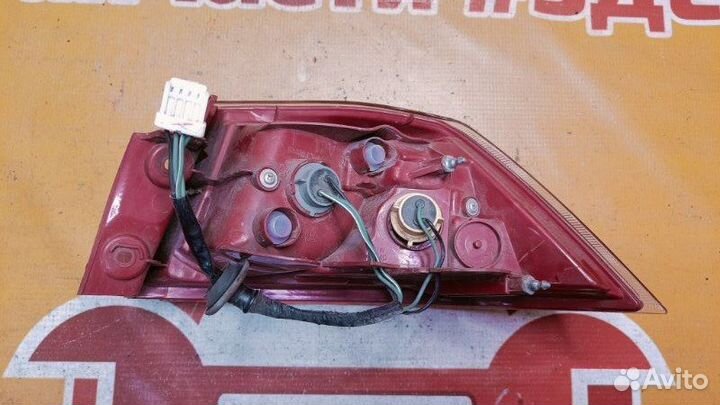 Фонарь задний левый Mitsubishi Lancer