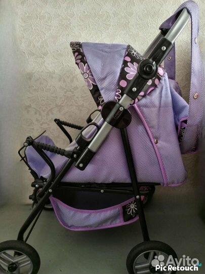 Игрушечная коляска для кукол