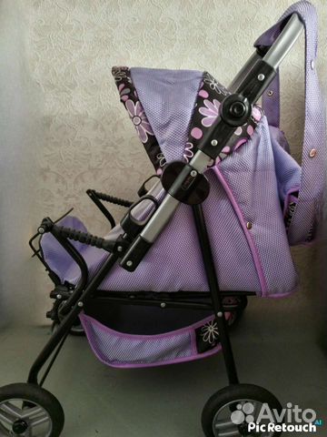 Игрушечная коляска для кукол