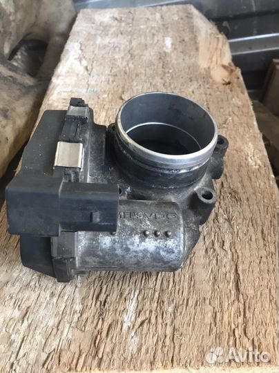 Дросельная заслонка Passat B6