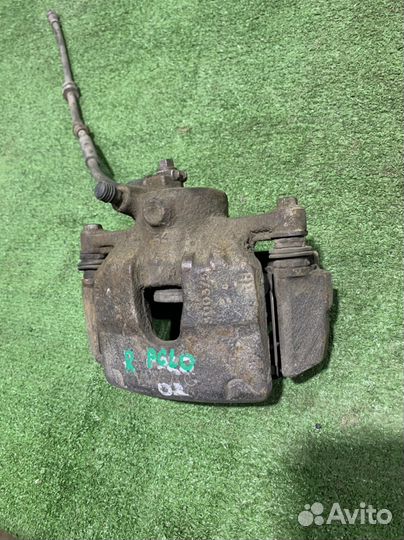 Передний правый тормозной суппорт VW Polo 5