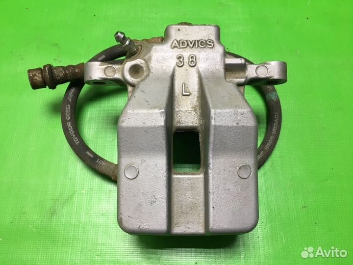 Суппорт задний левый Toyota Camry V40 2006-2011