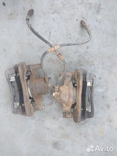 Суппорт тормозной передний Mazda 626 GE 1992-1997