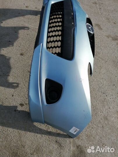 Бампер передний Mazda Demio DE