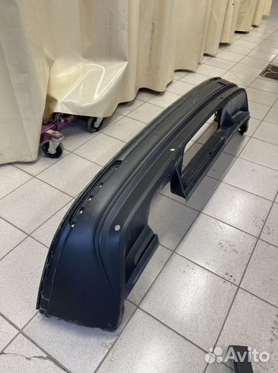 Спойлер черный заднего бампера