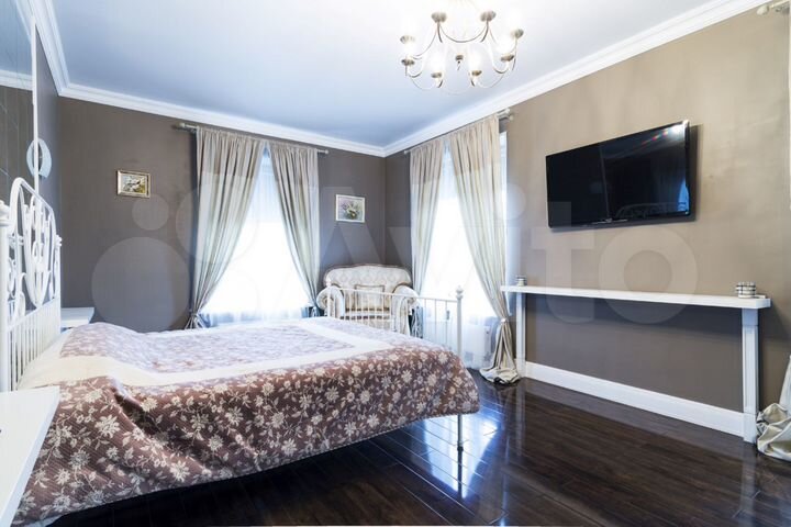 Коттедж 339 м² на участке 6 сот.