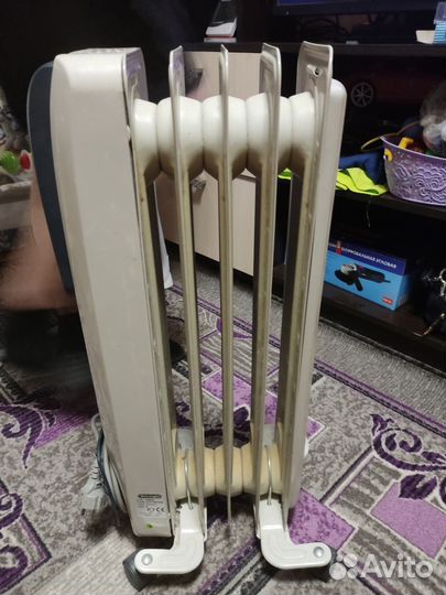 Масляный обогреватель delonghi