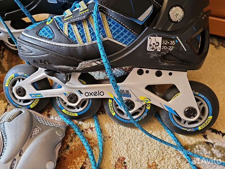 Роликовые коньки Oxelo раздвижные 32-35,защита