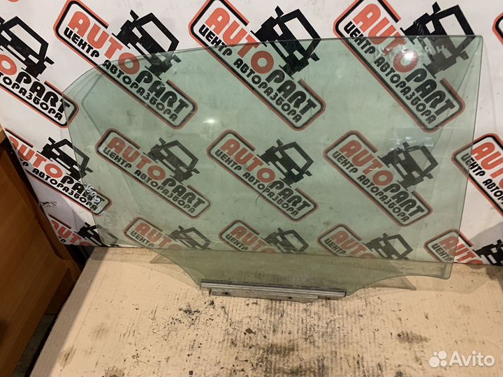 Стекло двери переднее заднее Toyota Corolla 150