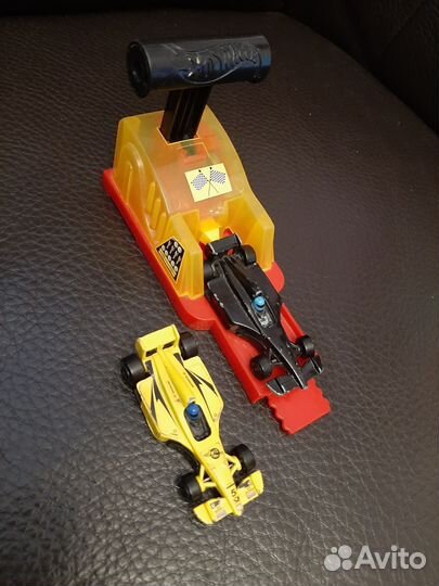 Детские игрушки машинки пакетом