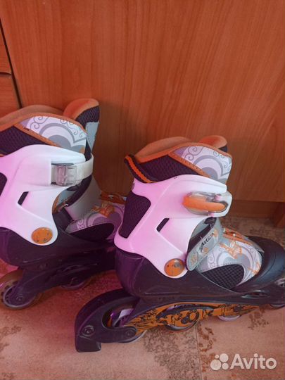 Роликовые коньки