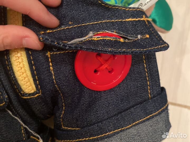 Игрушка для тренировки навыков одеваться