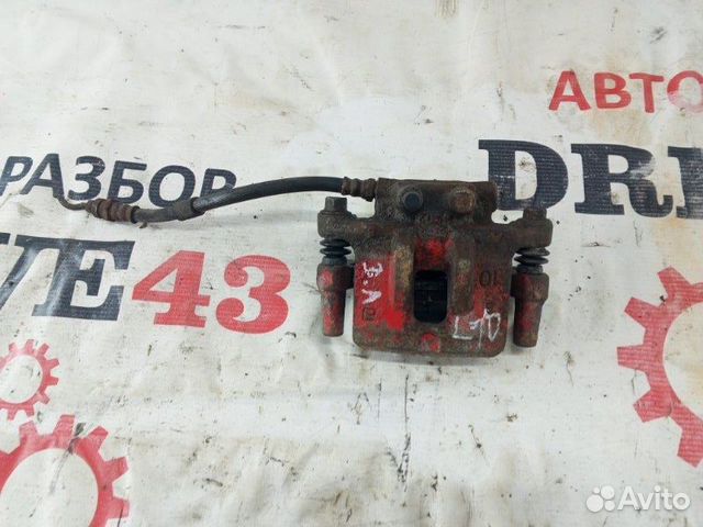 Суппорт задний левый Mitsubishi Lancer 10 седан