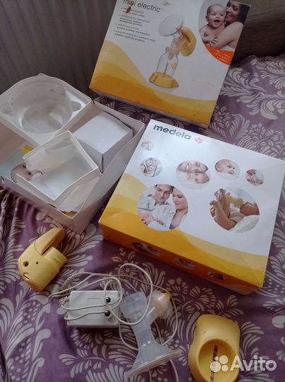 Молокоотсос medela электрический