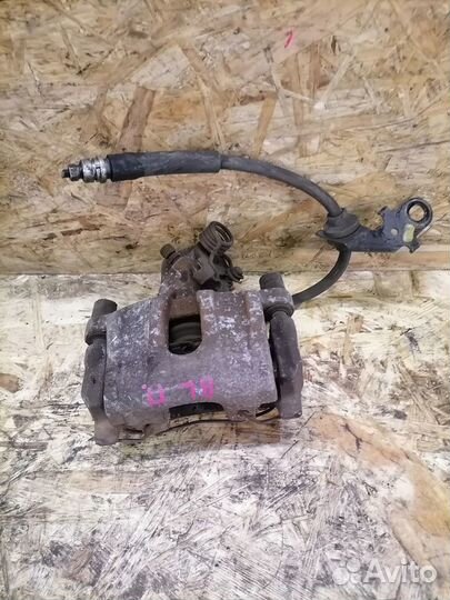 Тормозной суппорт задний правый Mazda 3 BL