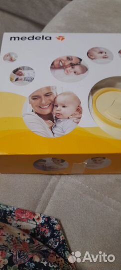 Молокоотсос medela электрический