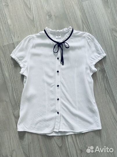 Школьная блузка Ostin на девочку 9 лет