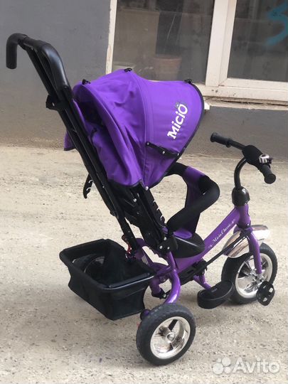 Трехколесный велосипед с ручкой