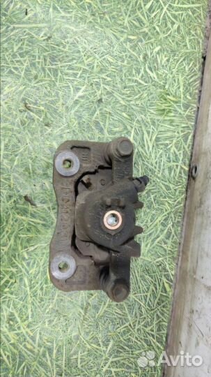 Суппорт задний левый Hyundai Tucson хэтчбек 2.0