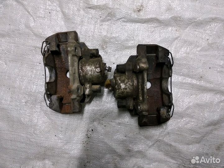 Суппорт передний левый Skoda Rapid