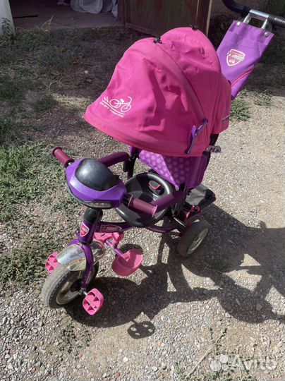 Трехколесный велосипед с ручкой