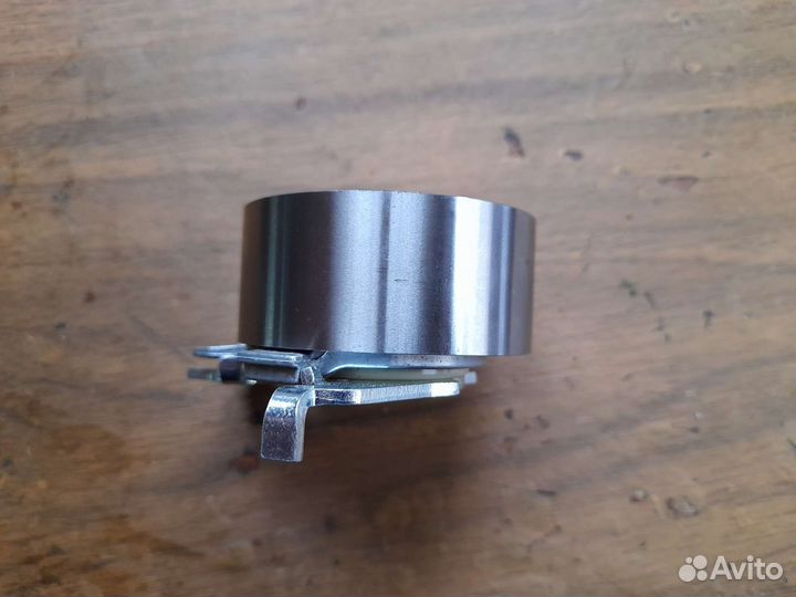 Ролик натяжной ремня грм Opel