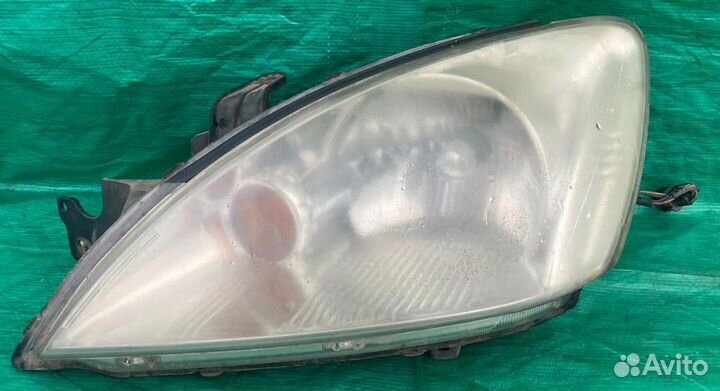 Фара Mitsubishi Lancer 9