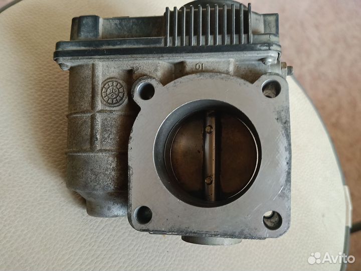 Продам дроссельную заслонку Ниссан альмера н16