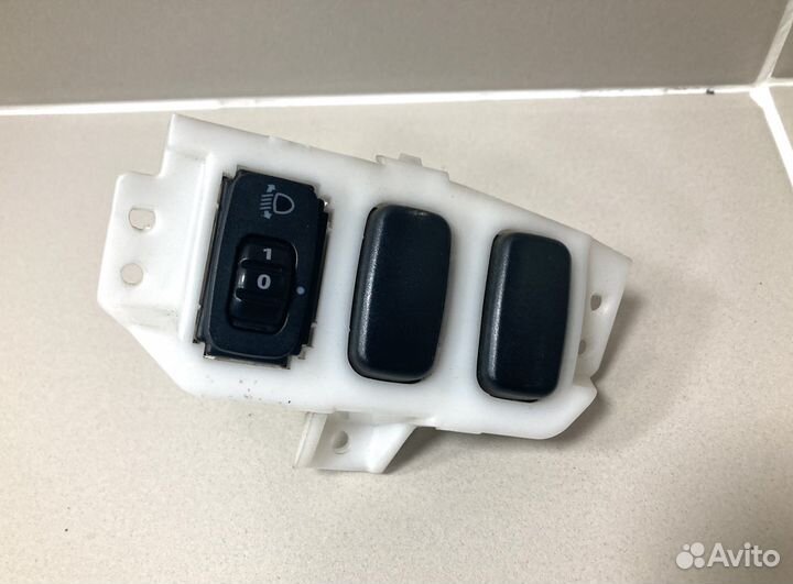 Блок регулировки света фар Mitsubishi 8614A038