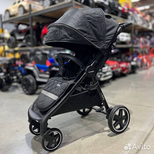 Прогулочная коляска новая