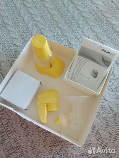Молокоотсос medela электрический