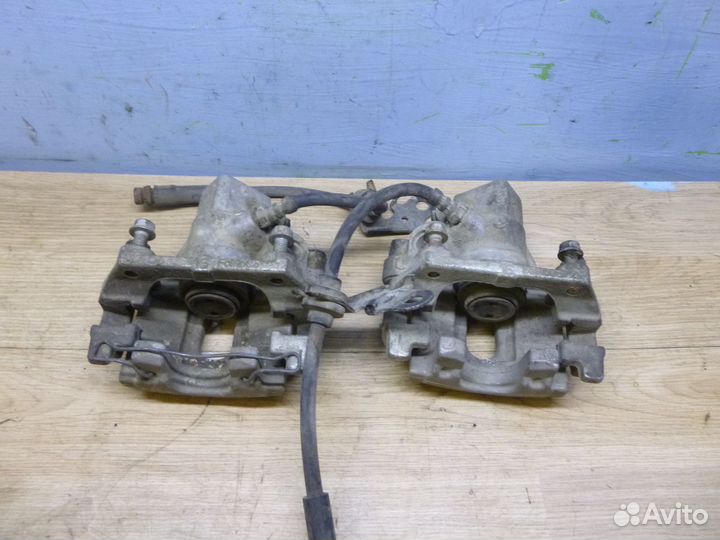 Суппорт задний левый,правый Mazda 3 (BK) 2002-2009