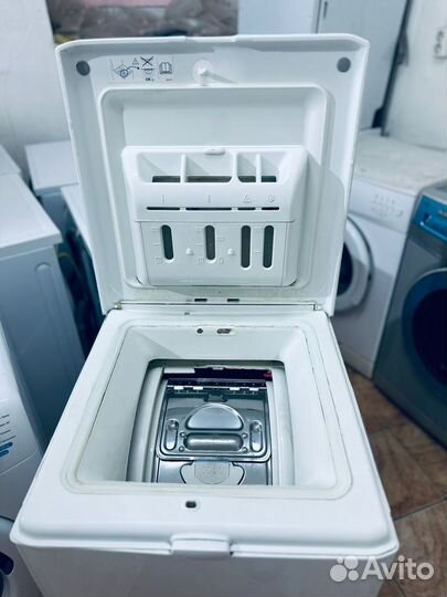 Вертикальная стиральная машина Brandt с сушкой