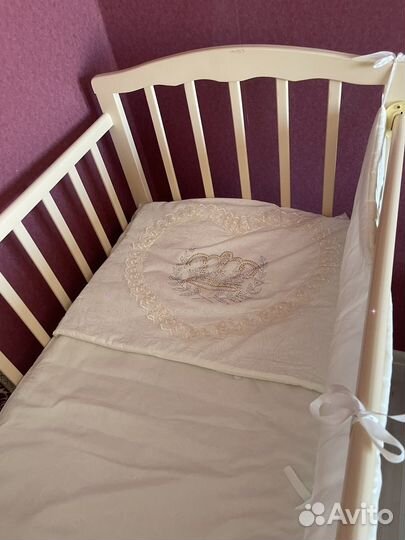 Кроватка детская с матрасом на колесах