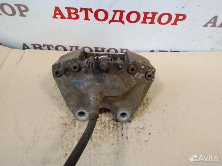 Суппорт тормозной задний левый Mercedes-Benz