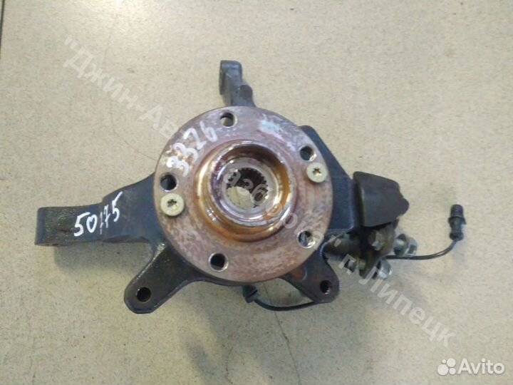 Кулак поворотный передний в сборе laguna 2