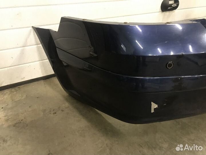 Задний бампер Opel Astra H