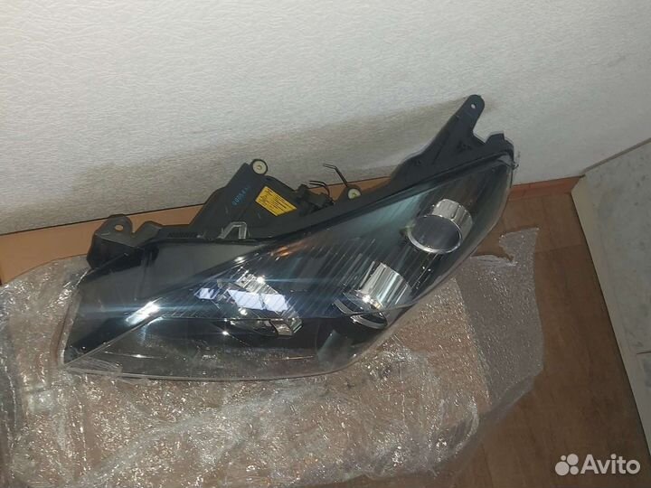 Фара левая Opel Astra h xenon