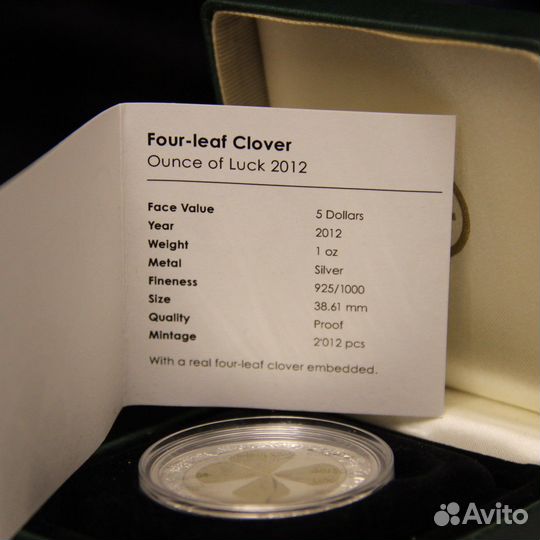 Монета серебро с клевером