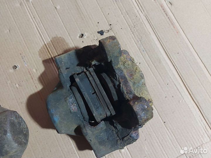 Суппорт задний правый; левый Опель; Вектра б