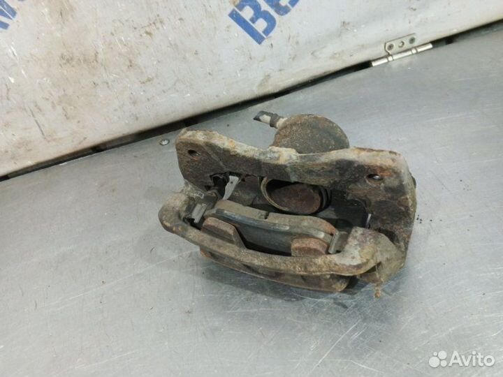 Суппорт тормозной передний левый Chevrolet Lacetti