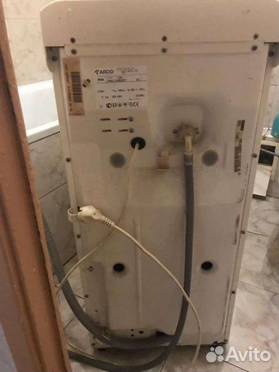 Стиральная машина с вертикальной загрузкой